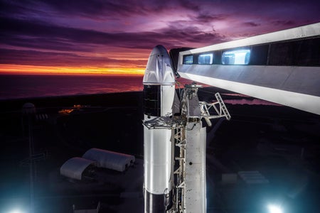 SpaceX Falcon 9 rocket vertical with the Crew Dragon atop.